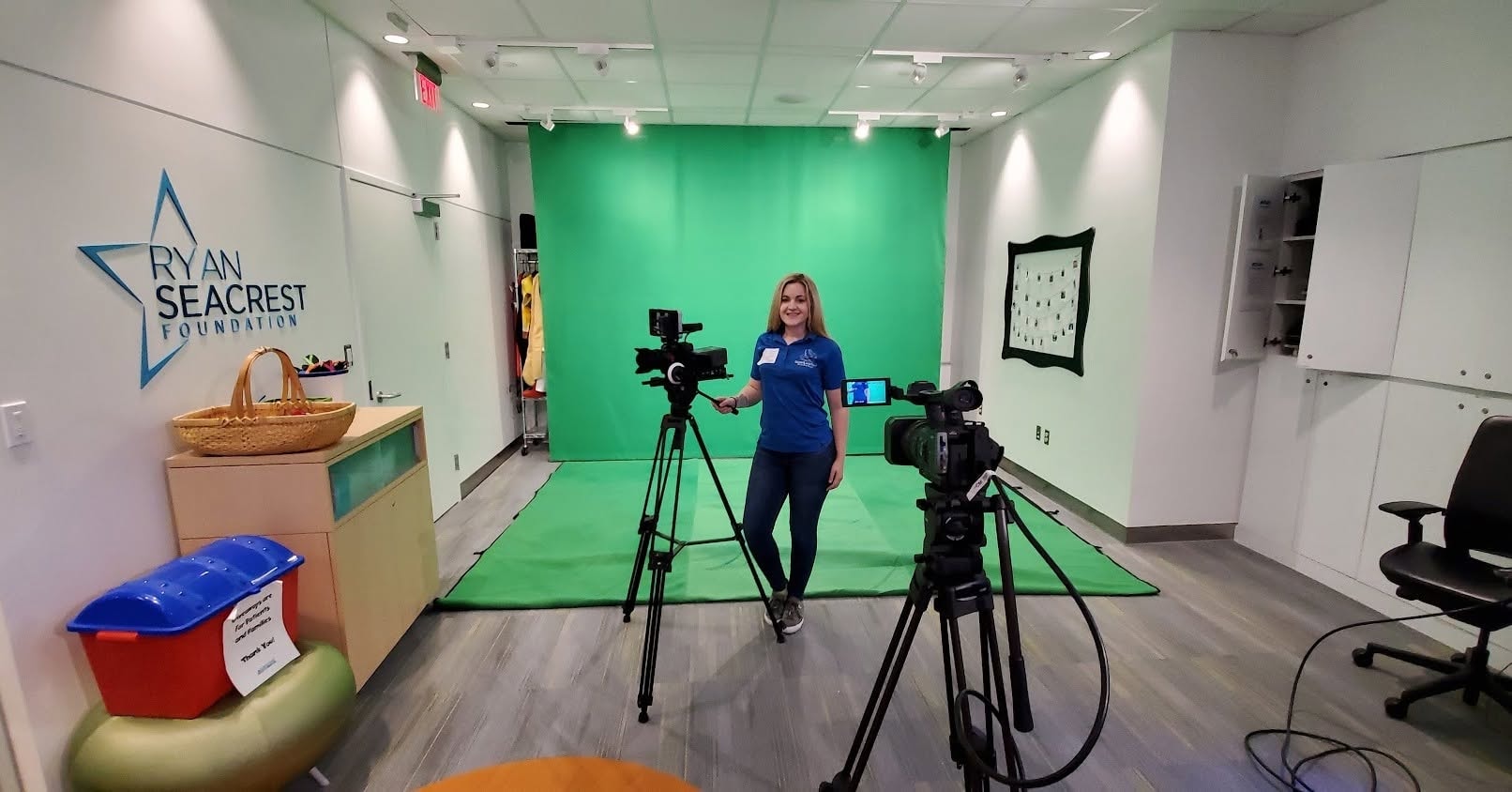 GoodLuckStef Productions video production crew on set with clapperboard during a corporate shoot in Virginia