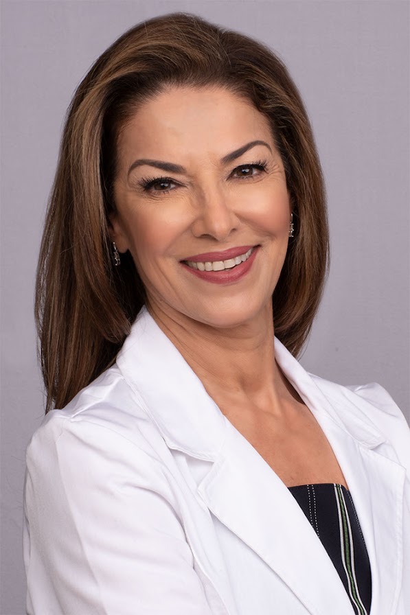 Professional Corporate Headshot Of A Female Executive In A White Blazer, Photographed By Goodluckstef Productions
