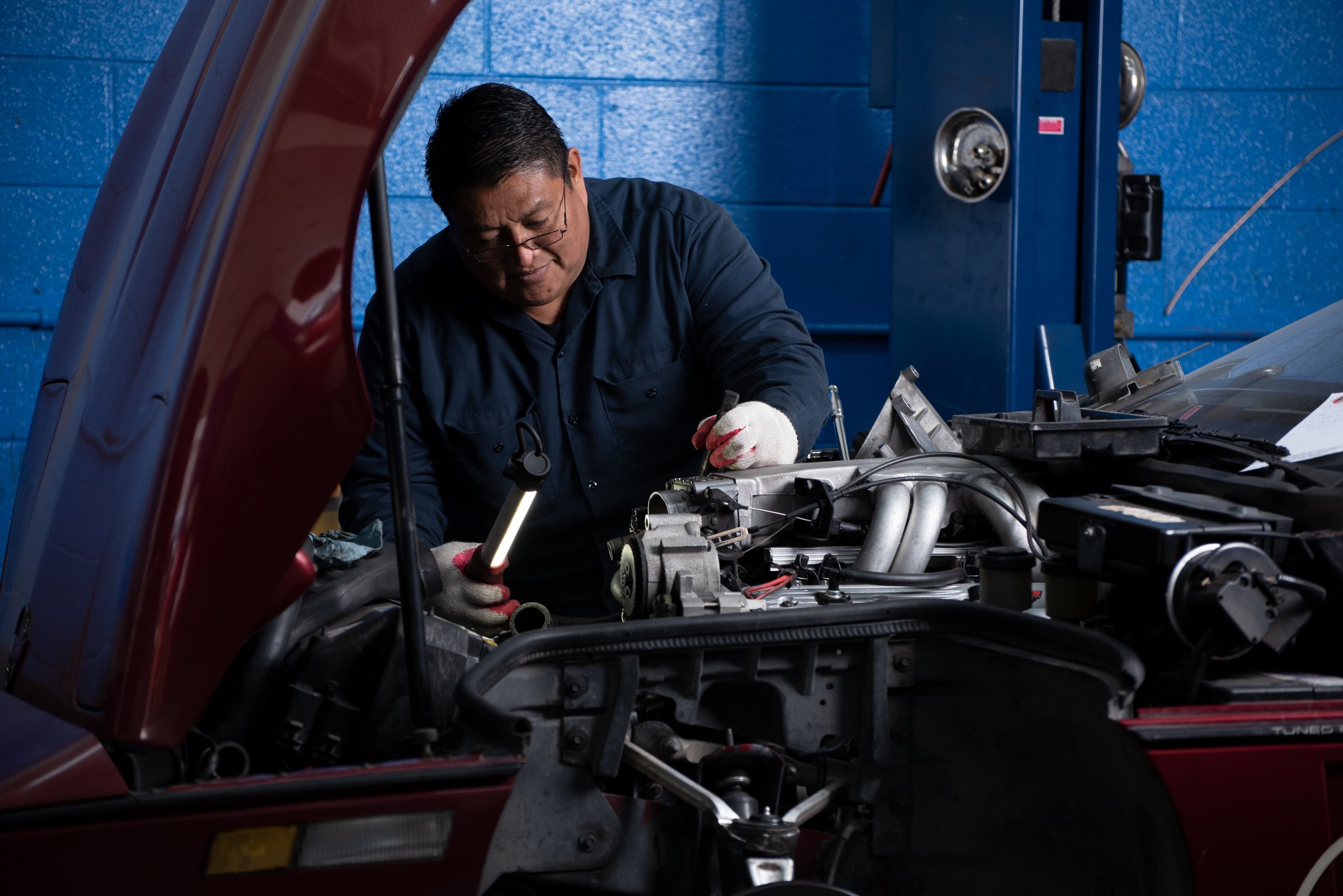 Professional Automotive Technician Working On Vehicle Engine - Goodluckstef Productions